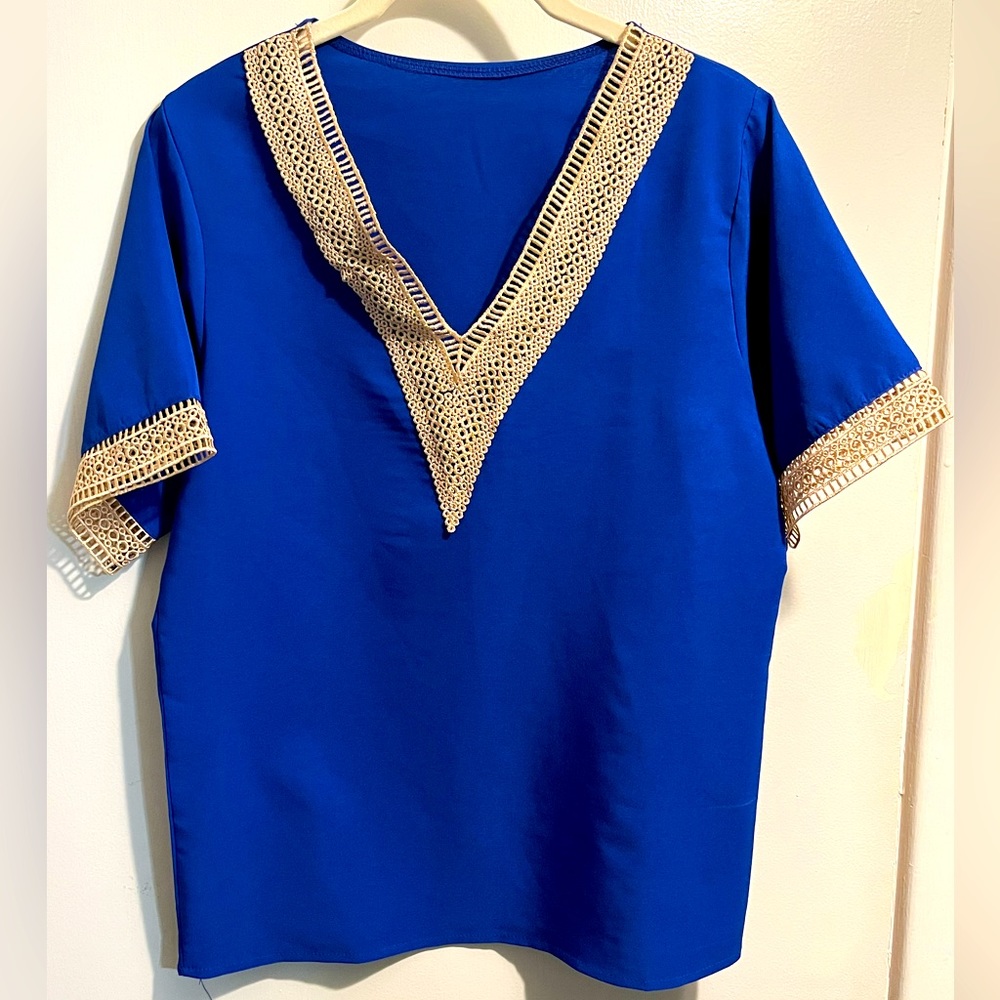 Beautiful bright blue v neck tee w/ lace details on sleeves and neckline